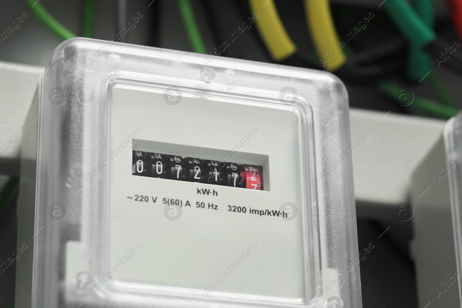 Photo of Electric meter and wires in fuse box, closeup