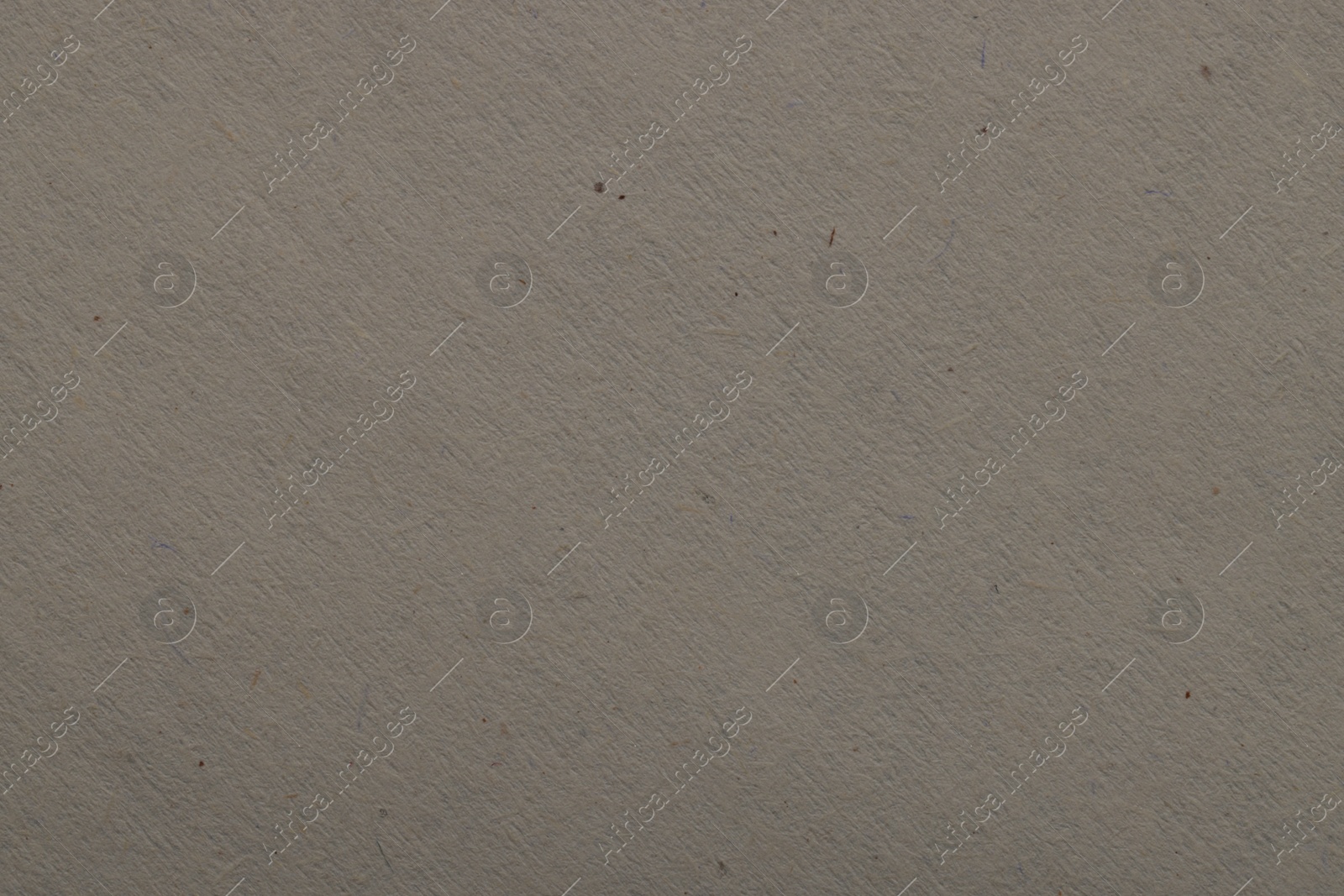 Photo of Texture of light grey paper sheet as background, top view