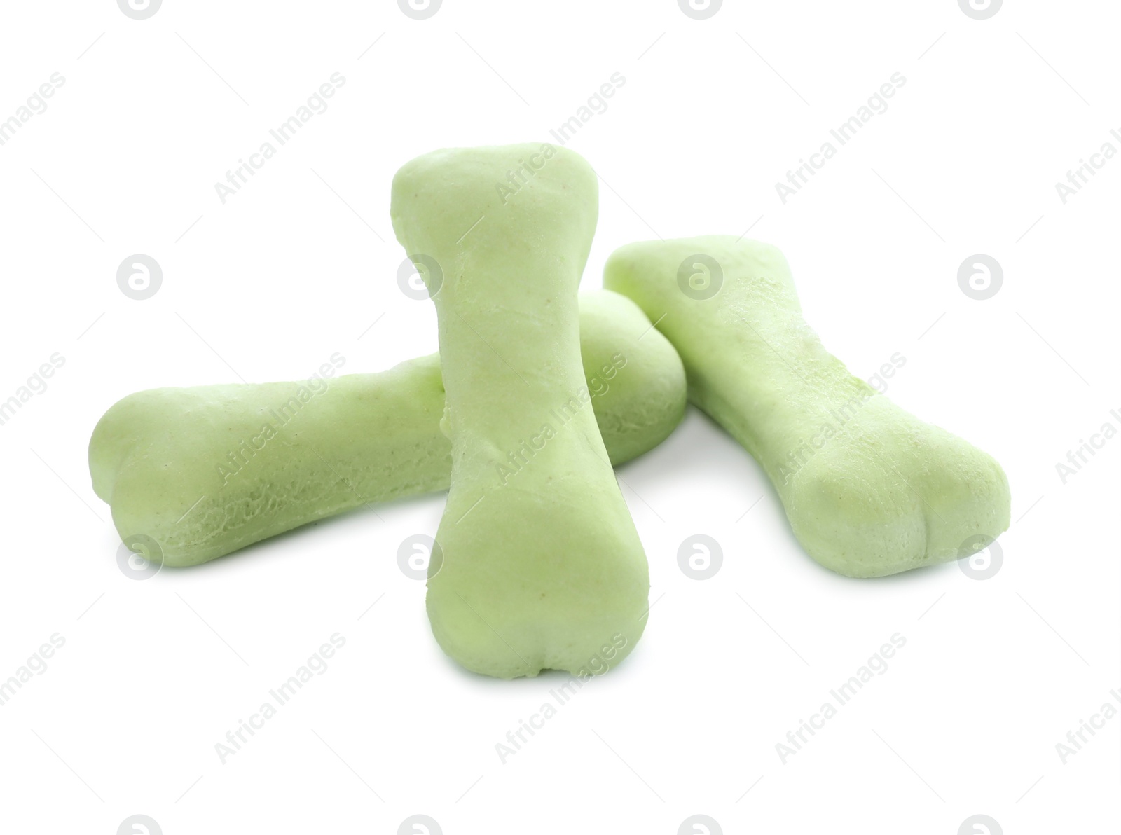 Photo of Bone shaped dog cookies on white background