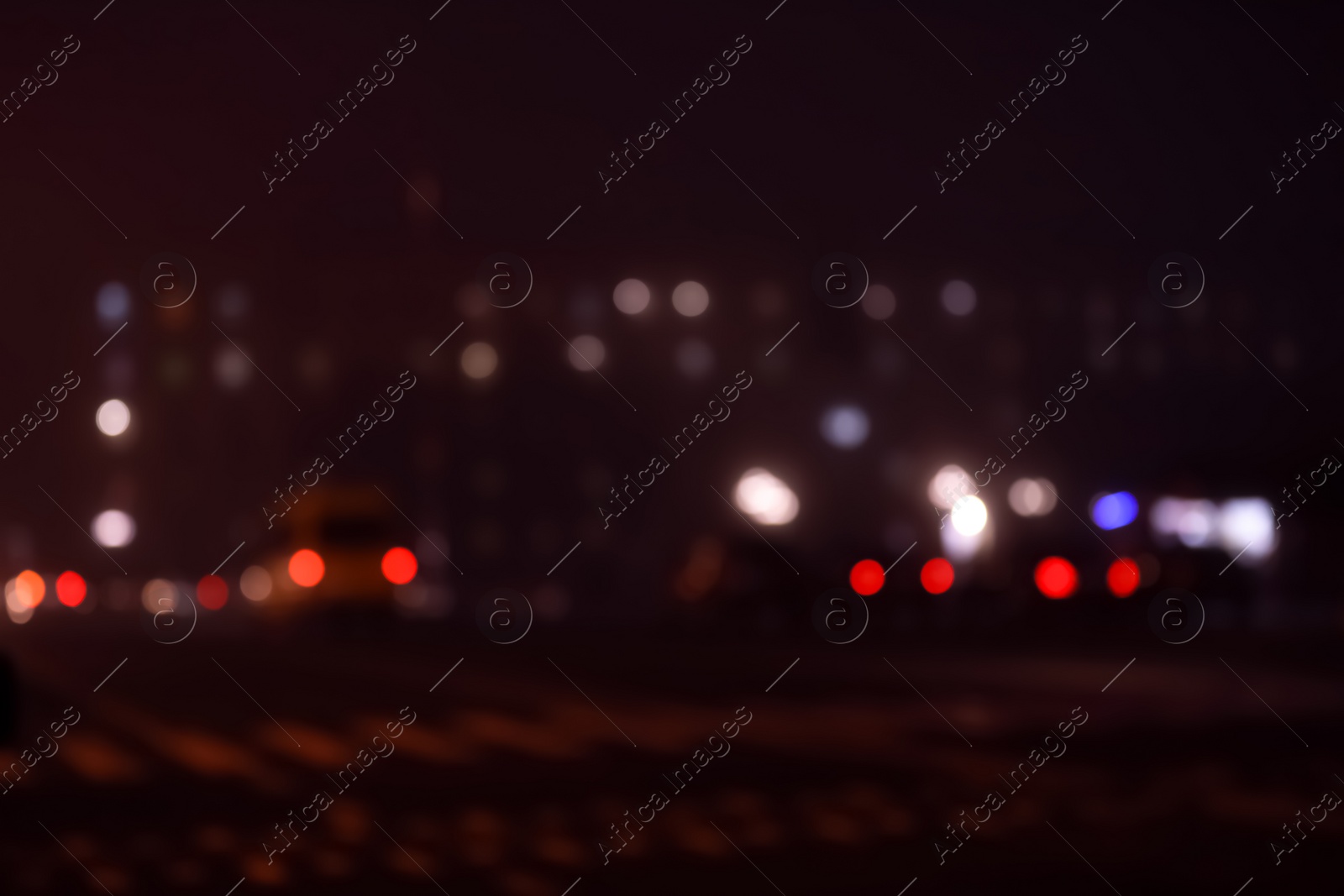 Photo of Blurred view of night city. Bokeh effect