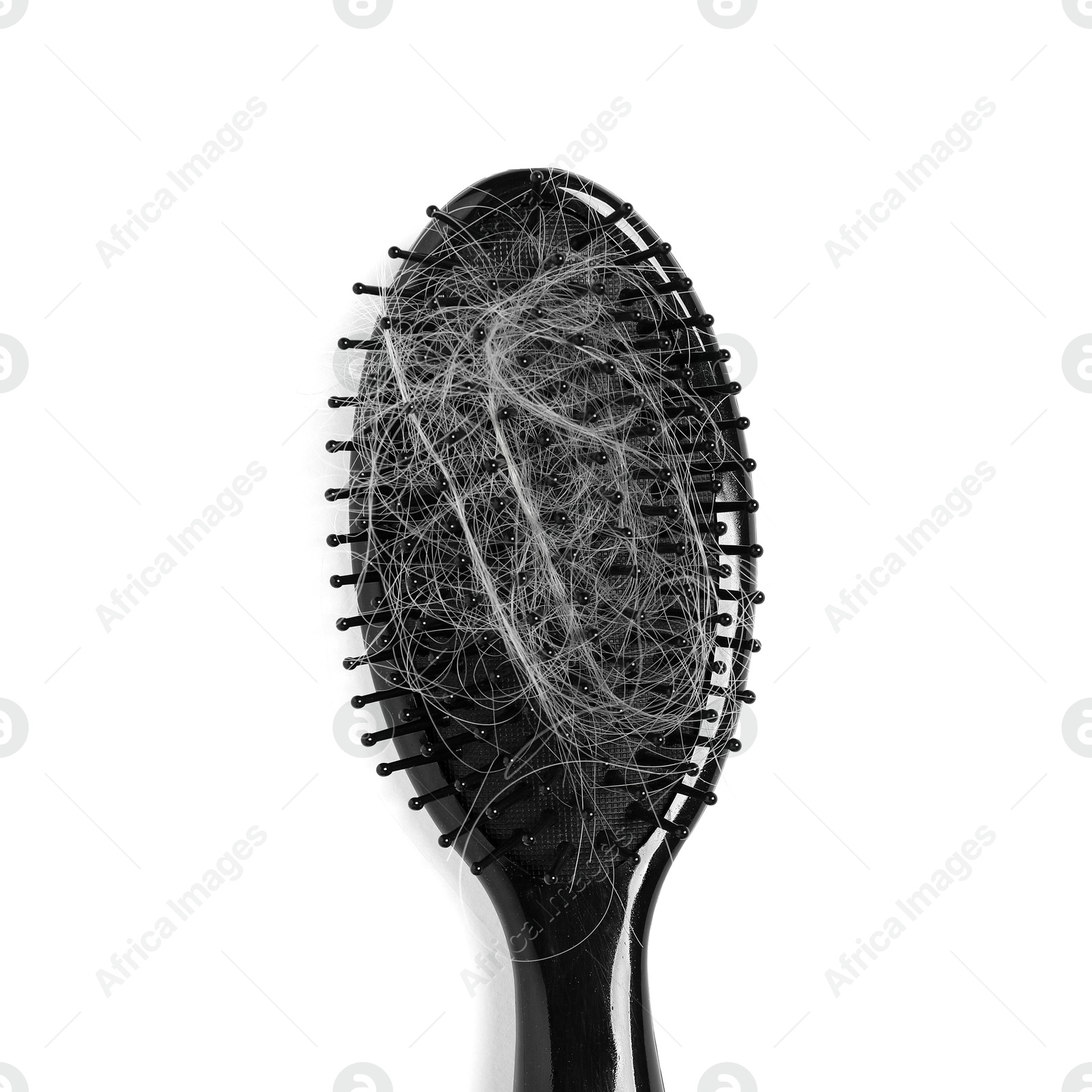 Photo of Brush with lost hair isolated on white, top view