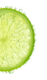 Fresh lime slice in sparkling water on white background