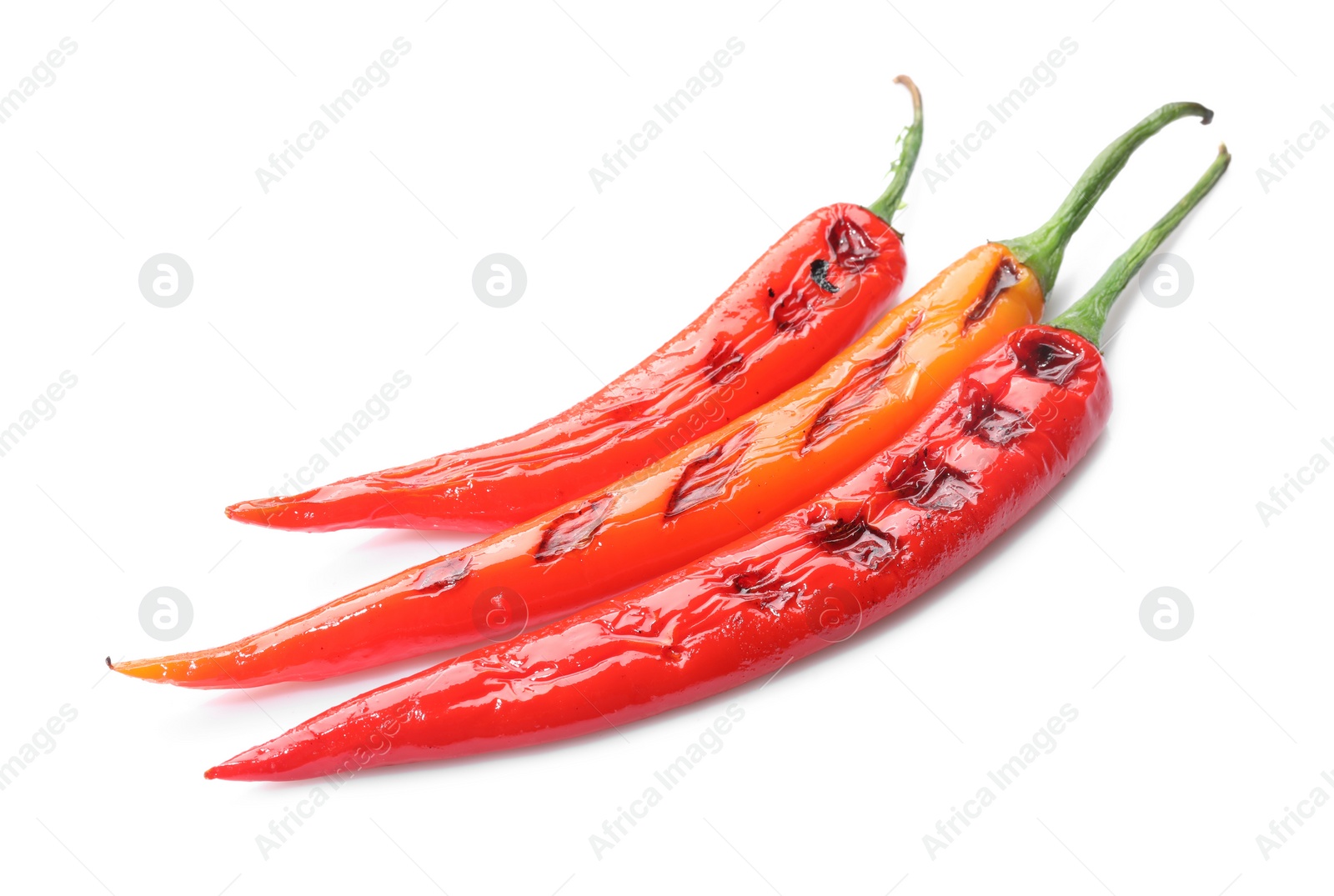 Photo of Tasty grilled chili peppers isolated on white