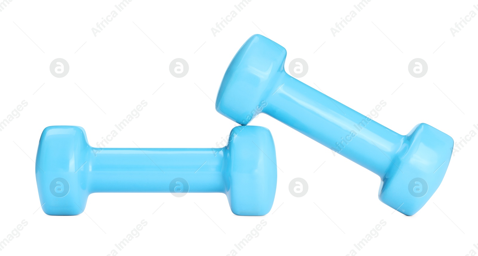 Photo of Light blue dumbbells isolated on white. Sports equipment