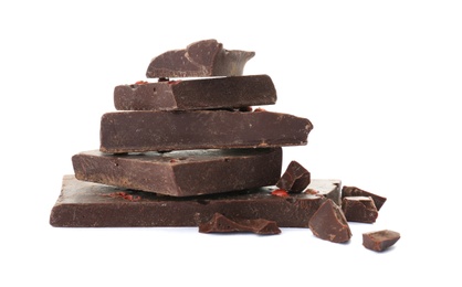 Photo of Delicious black chocolate pieces on white background