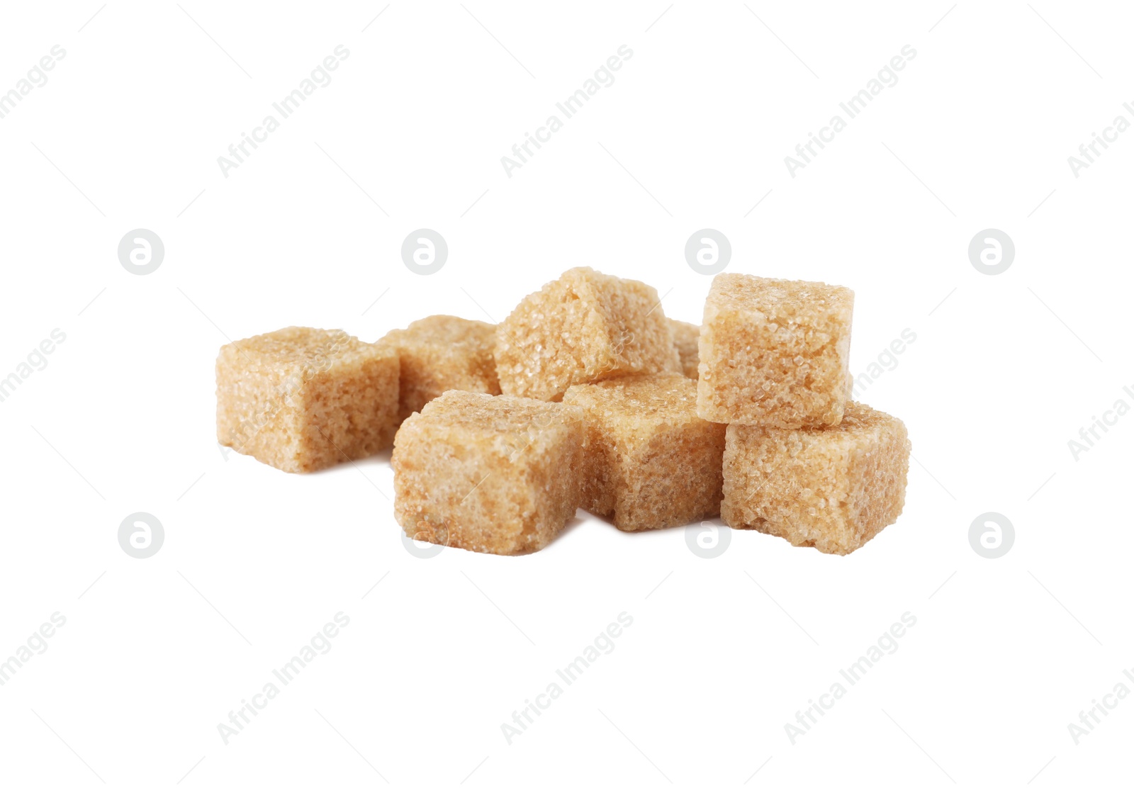 Photo of Pile of brown sugar cubes isolated on white