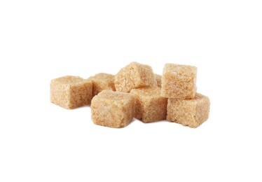 Photo of Pile of brown sugar cubes isolated on white