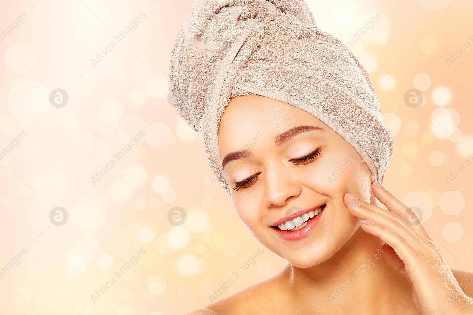 Image of Beautiful young woman with silky skin on light background, space for text. Spa treatment 