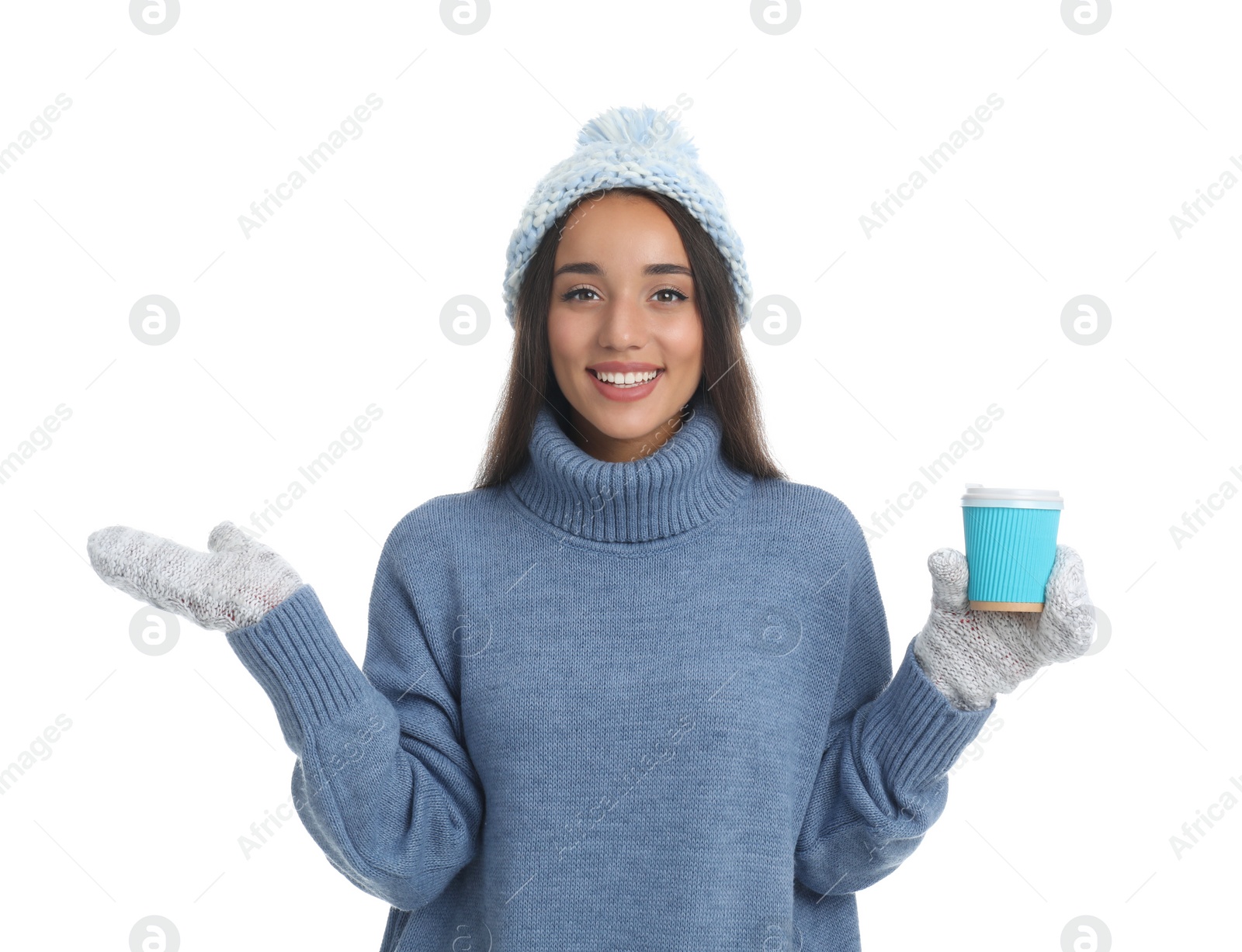 Photo of Happy beautiful woman with paper cup of mulled wine on white background