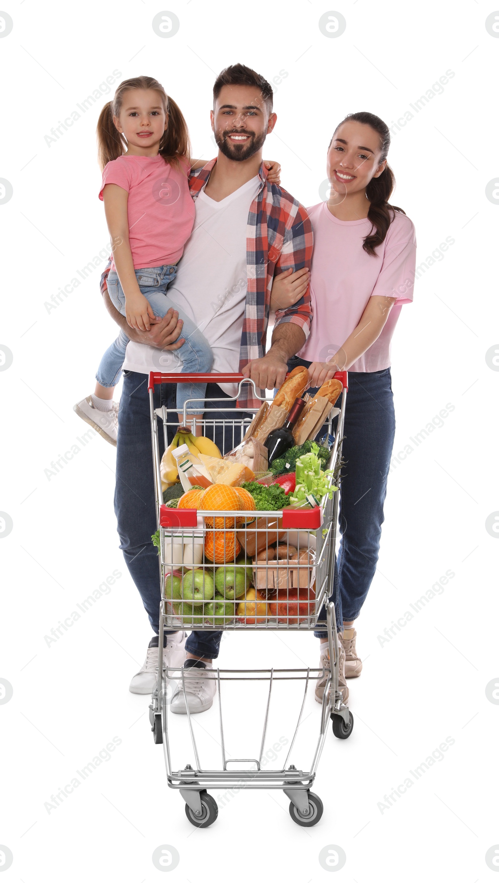 Photo of Happy family with shopping cart full of groceries on white background