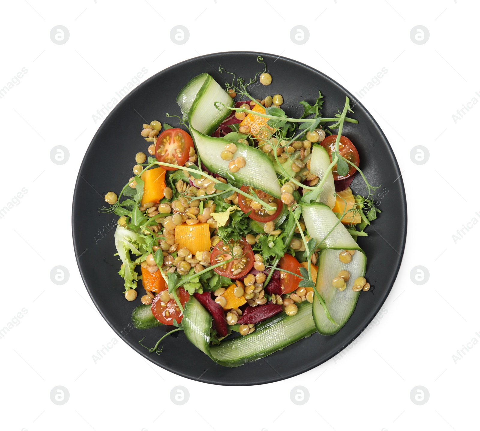 Photo of Plate of delicious salad with lentils and vegetables isolated on white, top view