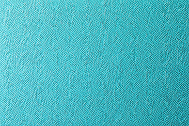 Texture of turquoise leather as background, closeup