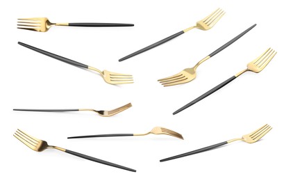 Image of Shiny golden forks isolated on white, set