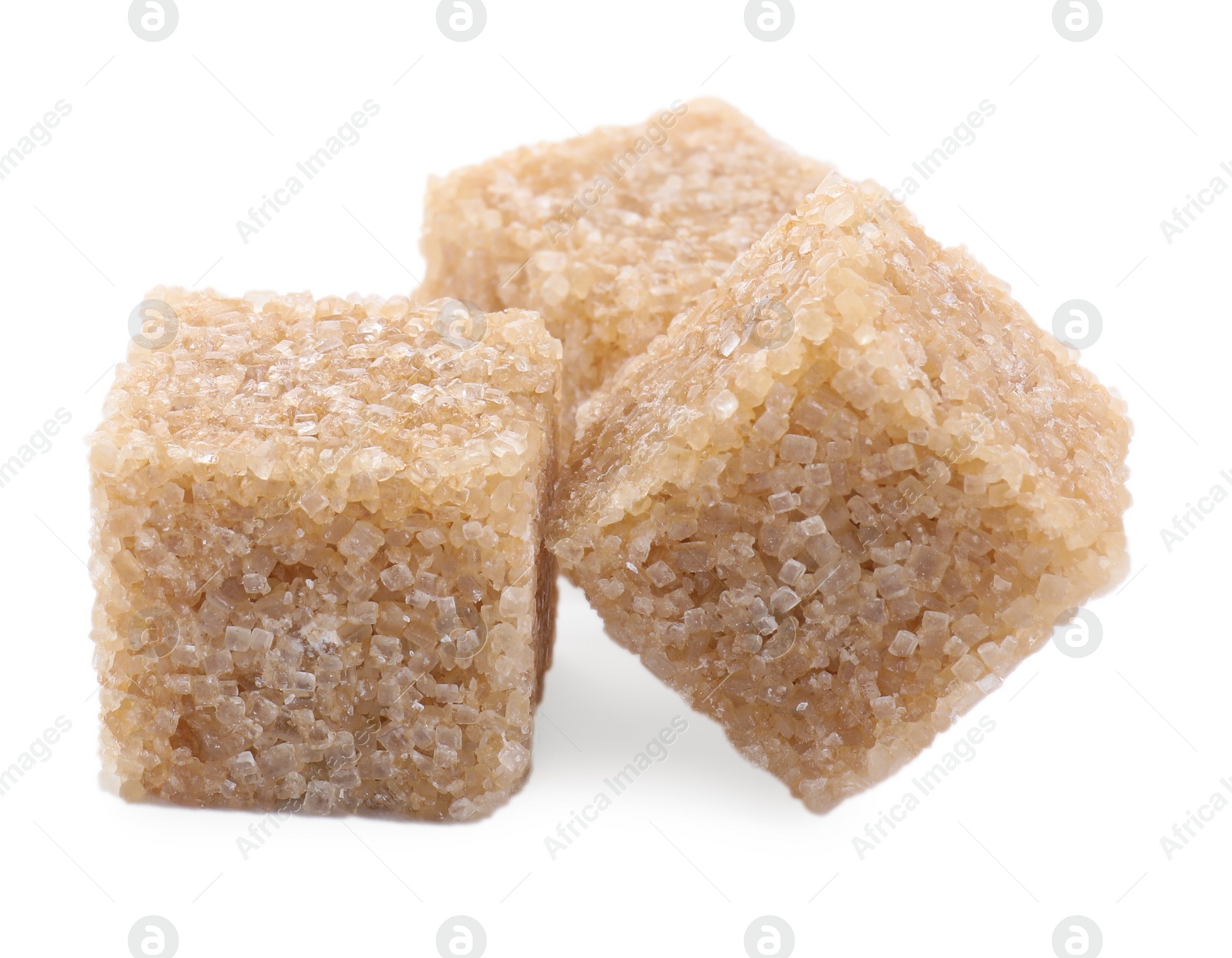 Photo of Three brown sugar cubes isolated on white