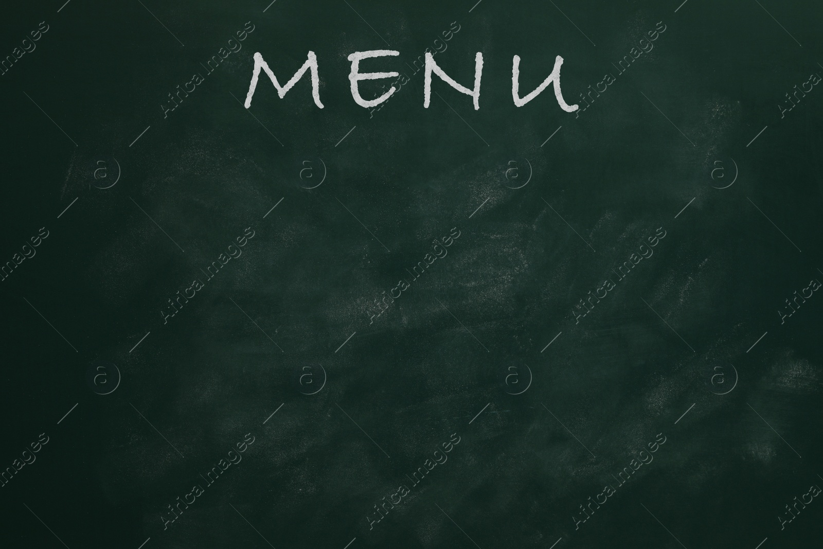 Image of Green chalkboard with word Menu as background. Mockup for design