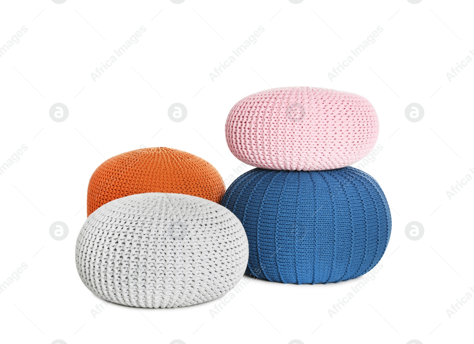 Photo of Different stylish poufs on white background. Home design