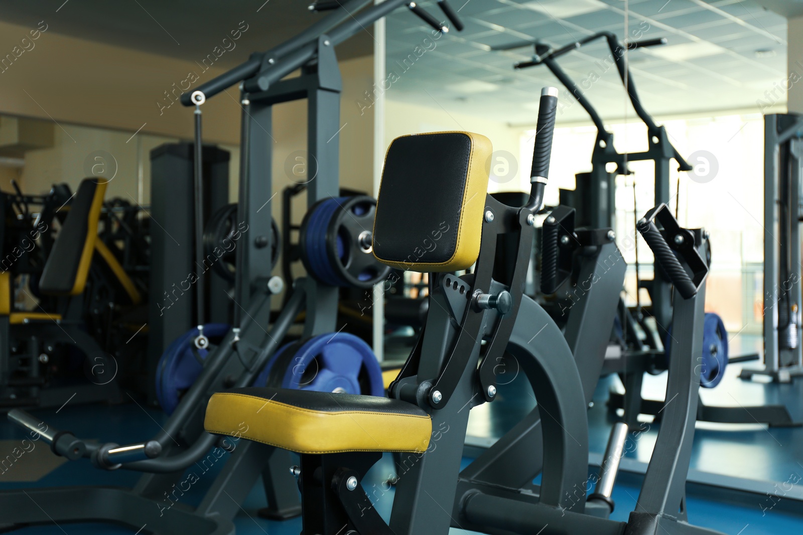 Photo of Seated rowing hammer machine in modern gym