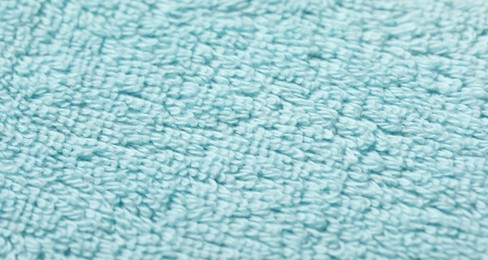 Texture of soft light blue fabric as background, top view