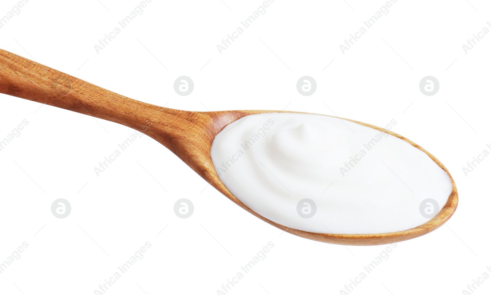 Photo of One wooden spoon with sour cream isolated on white