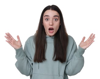 Portrait of surprised young woman on white background