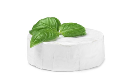 Photo of Tasty brie cheese with basil isolated on white