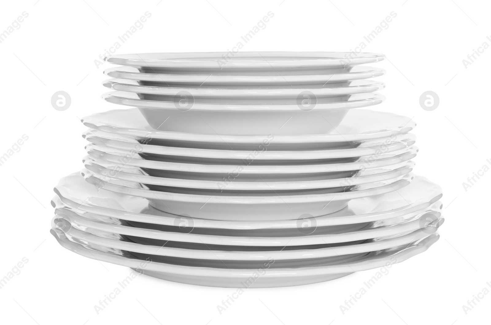Photo of Stack of clean plates on white background
