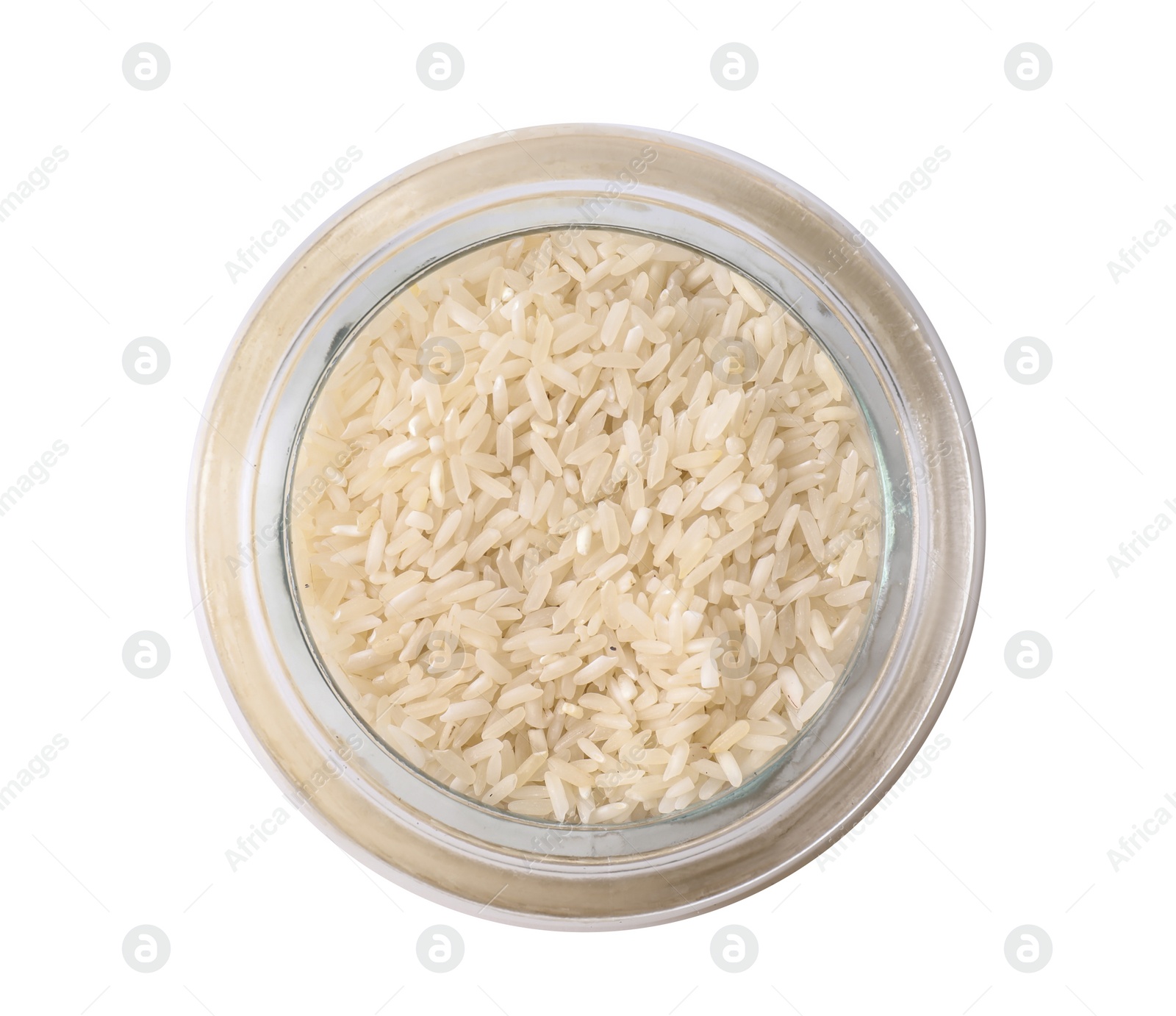 Photo of Uncooked rice in glass jar isolated on white, top view