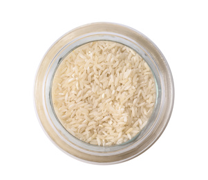 Photo of Uncooked rice in glass jar isolated on white, top view