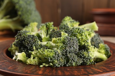 Fresh raw broccoli on plate, closeup view