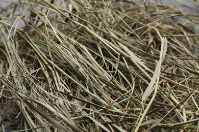 Photo of Heap of dried hay as background, closeup