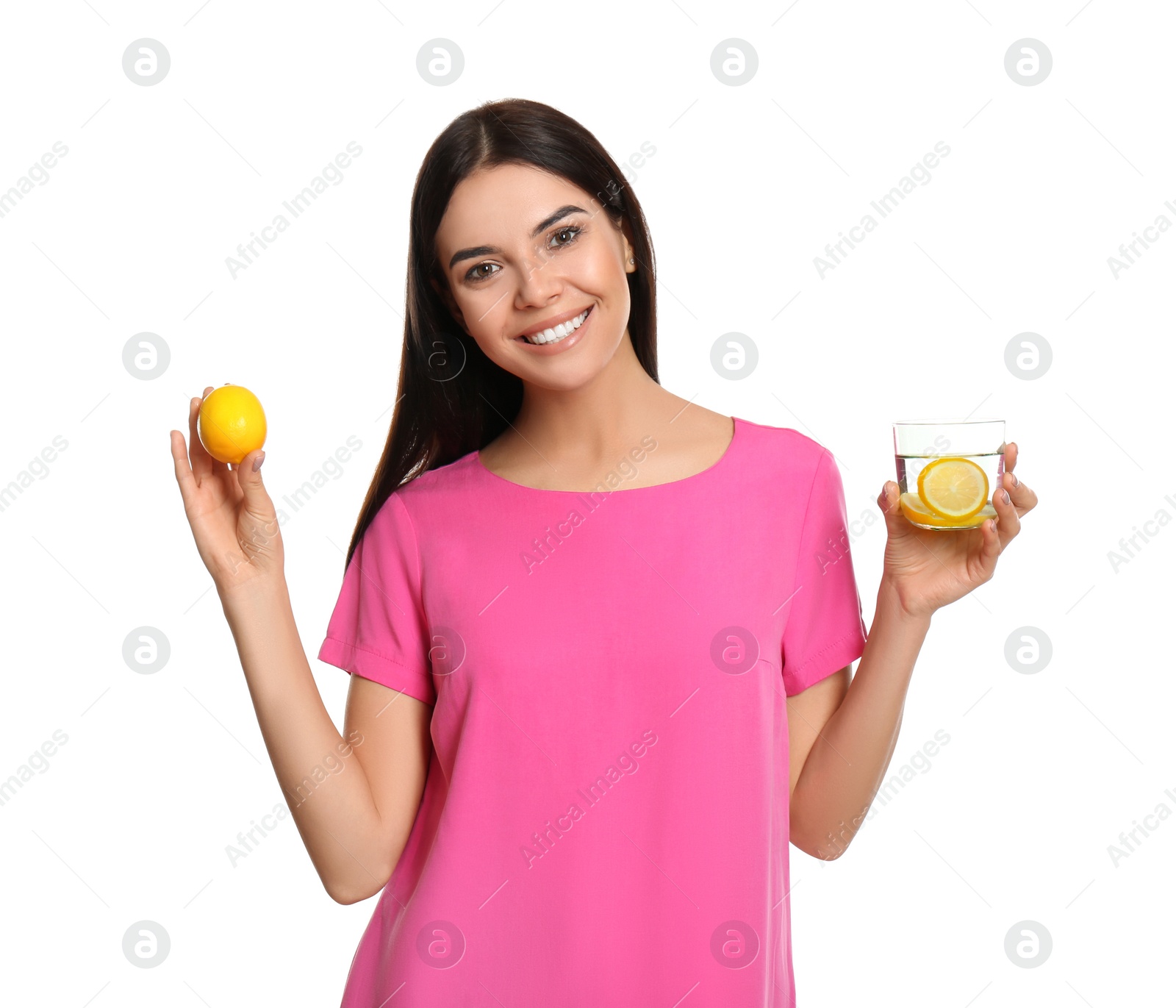 Photo of Beautiful young woman with tasty lemon water and fresh fruit on white background