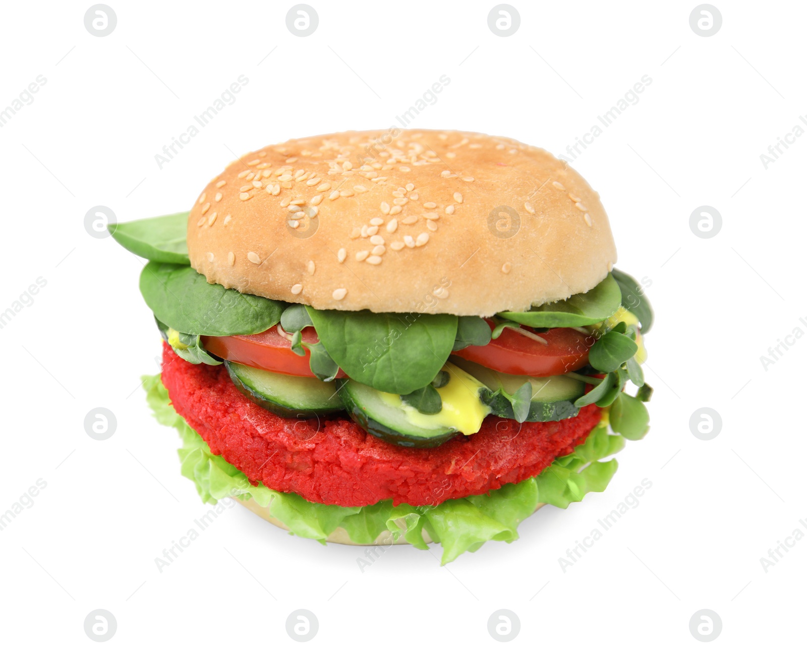 Photo of Tasty vegan burger with vegetables, patty and microgreens on white tiled table, closeup. Space for text