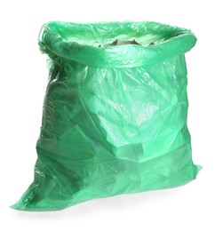 Green trash bag full of garbage isolated on white