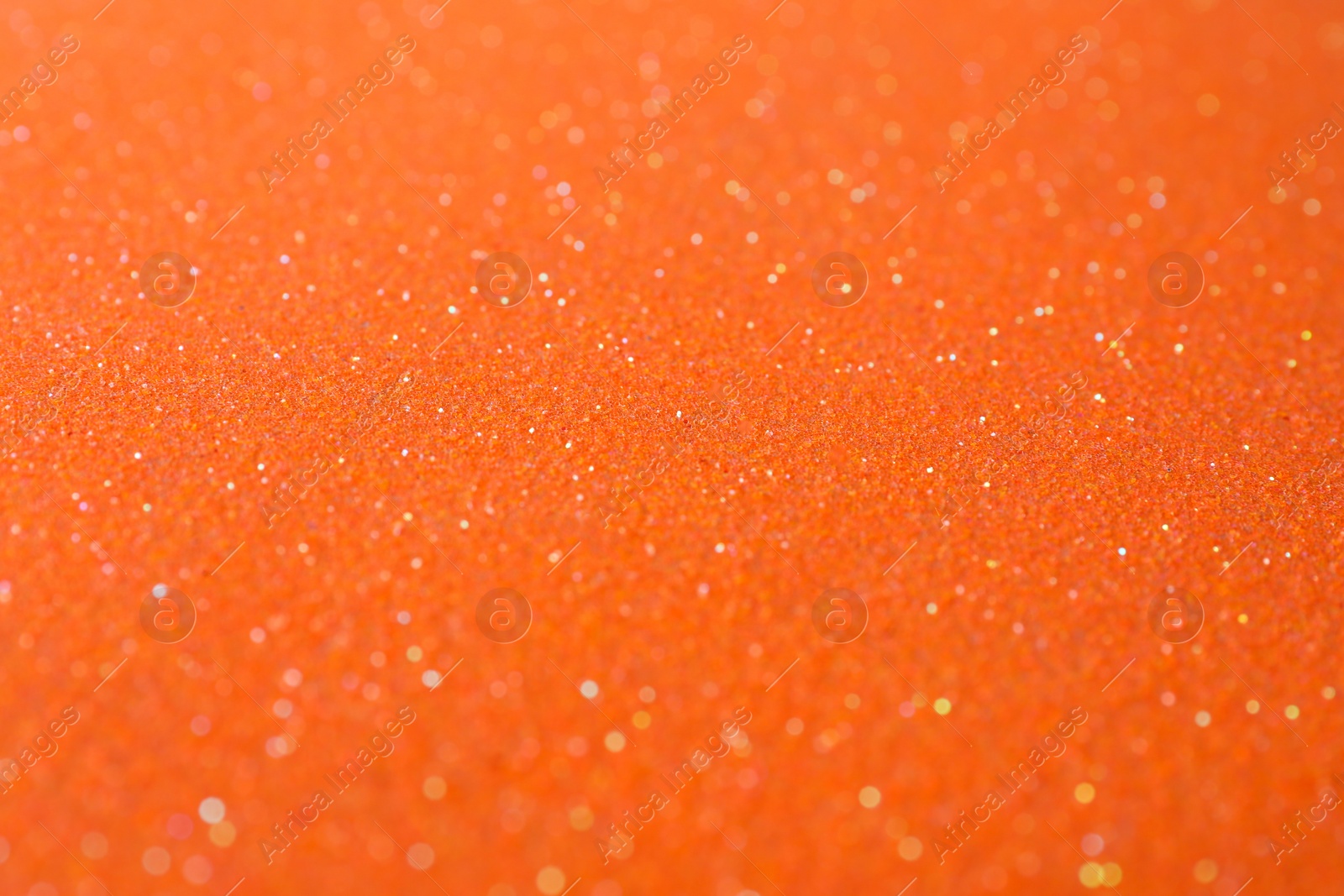 Photo of Orange textured surface as background, closeup view