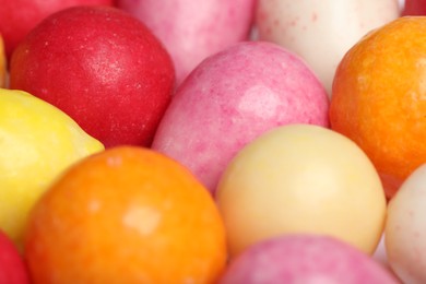Photo of Many tasty bubble gums as background, closeup