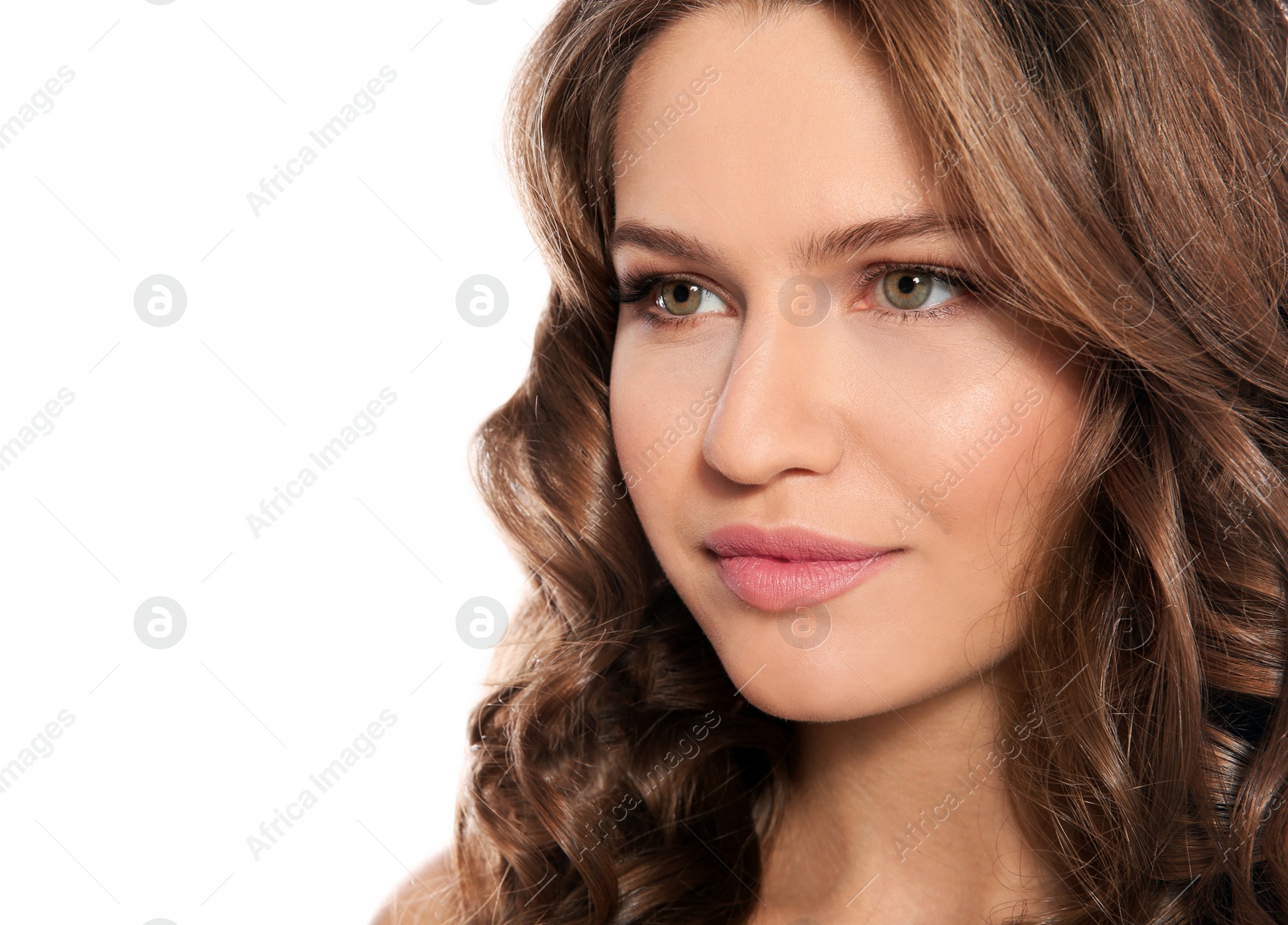 Photo of Portrait of beautiful young woman with shiny wavy hair on white background, closeup