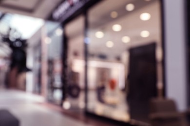 Photo of Blurred view of shopping mall interior. Bokeh effect