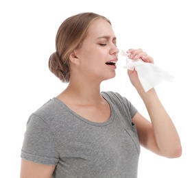 Photo of Young woman suffering from allergy on white background