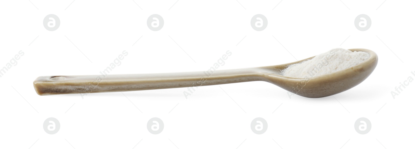 Photo of Baking powder in spoon isolated on white