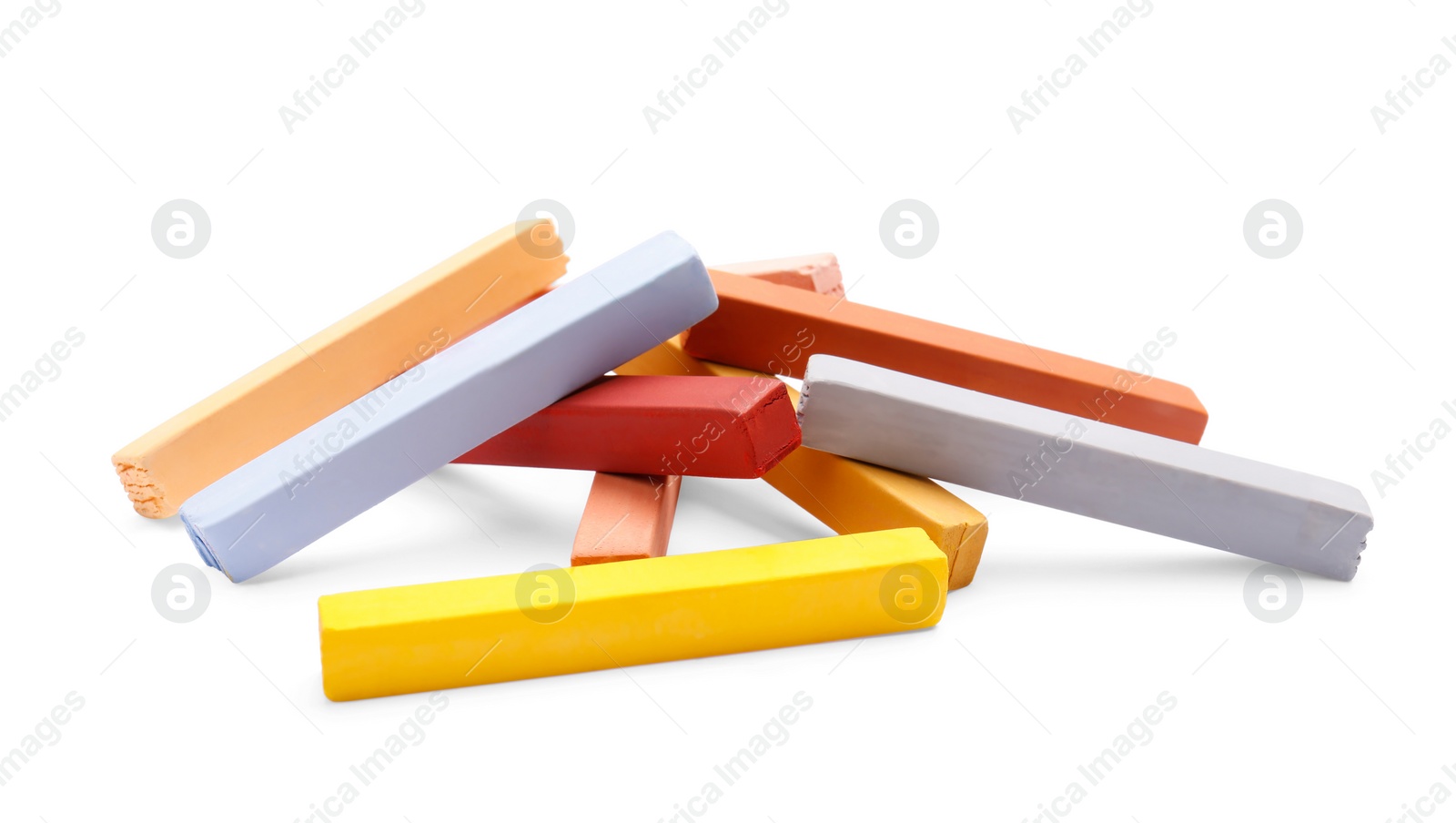 Photo of Colorful pastels on white background. Drawing materials