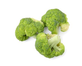 Photo of Fresh raw green broccoli isolated on white, top view