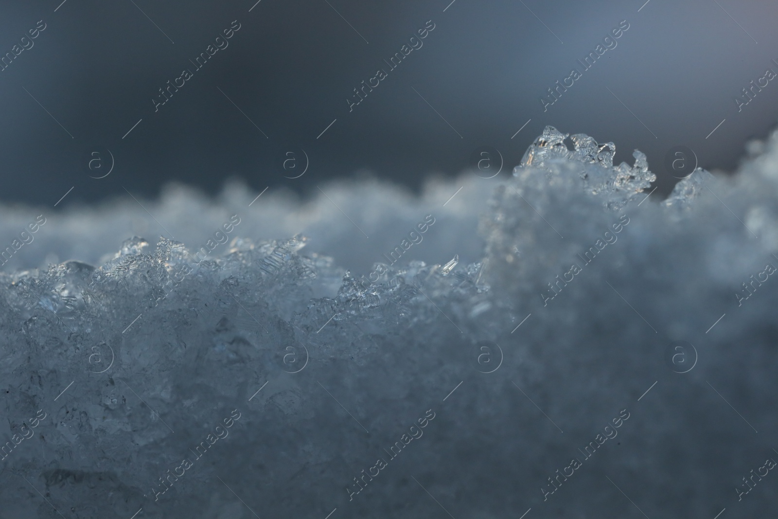 Photo of White snow, closeup view. Seasonal weather conditions