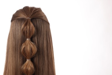 Woman with braided hair on white background, back view