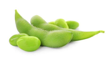 Photo of Fresh green edamame pods and beans on white background