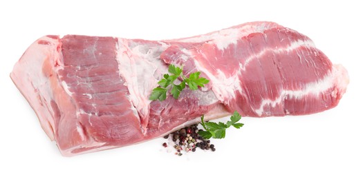 Photo of Piece of raw pork belly, parsley and spices isolated on white, above view