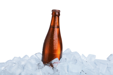 Ice cubes and bottle on white background