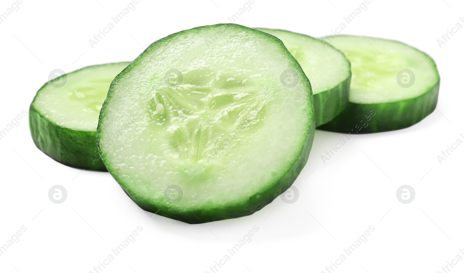 Photo of Slices of fresh cucumber isolated on white