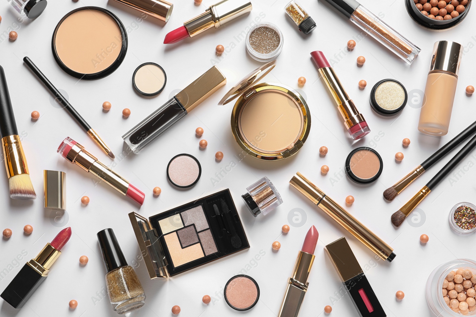 Photo of Different luxury makeup products on white background, top view