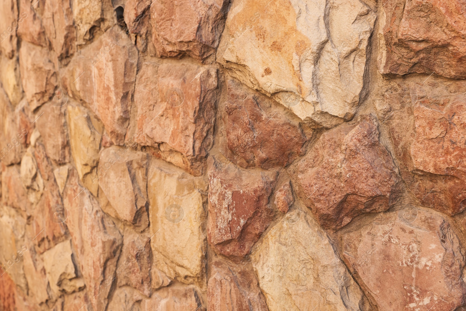 Photo of Texture of brown brick wall as background