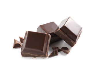 Photo of Pieces of tasty dark chocolate on white background